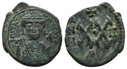 Maurice Tiberius, 582-602. Half Follis, Theoupolis (Antiochia), struck 583/584 (2 RY)

Obv.: ΠITA… Crowned facing bust of Maurice Tiberius, wearing ...