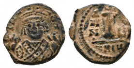 Maurice Tiberius 582-602 AD., AE Decanummium, Antioch mint (Theoupolis), struck c. 596
Obv.: Facing bust, crowned with trefoil ornament, in consular ...
