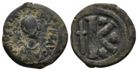 Justin I, 518-527, Constantinople Mint, struck 518-527
Obv.: Diademed, draped, and cuirassed bust right
Rv.: Large K; long cross to left, star above...