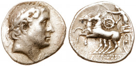 Euboia, Karystos. Silver Didrachm (6.98 g), ca. 235-200 BC. Laureate male head right. Reverse: [K]APY&Sigma;TI&Omega;[N], Nike driving galloping biga ...
