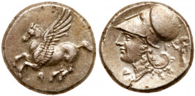 Corinthia, Corinth. Silver Stater (8.57 g), ca. 375-300 BC. Pegasos flying left; below, koppa. Reverse: Helmeted head of Athena left; across field, &D...