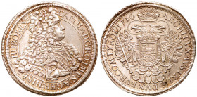 Charles VI (1711-1740). Silver Taler, 1716. Vienna mint. Laureate and armored bust right. Reverse; Crowned imperial double eagle with crowned arms on ...
