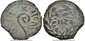 JUDAEA. Roman Procurators. Pontius Pilate (AD 26-36). AE prutah (15mm, 11h). NGC Choice VF. Dated Regnal Year 17 of Tiberius (AD 30/1). TIBEPIOY KAICA...