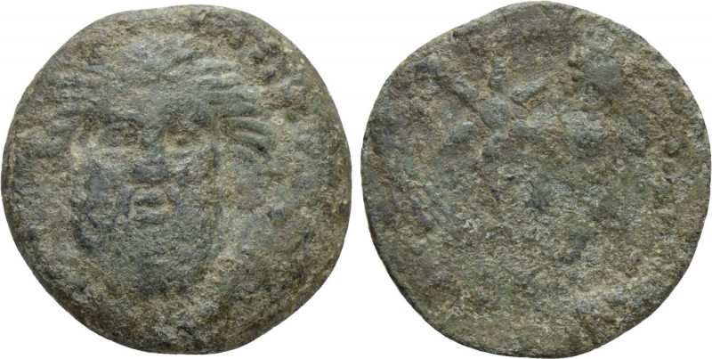 MAURETANIA. ŠMŠ (Volubilis?). Ae Half Unit(Circa 50-1 BC). 

Obv: Facing head ...