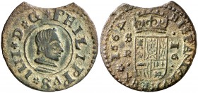 166. Felipe IV. Sevilla. R. 16 maravedís. (Cal. 1571) (J.S. M-619). 4,07 g. El 4 de la fecha girado. Cospel mal cortado. (MBC+).