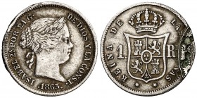 1863. Isabel II. Sevilla. 1 real. (Cal. 443). 1,33 g. Defecto de acuñación en reverso. Parte de la gráfila de otra moneda. Muy curiosa. (MBC-).
