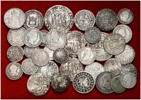 Lote de 35 monedas españolas en plata, desde los Reyes Católicos hasta Isabel II. A examinar. RC/BC+.