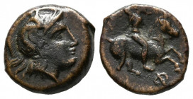 TESALIA, Pharsalos. Chalkous. (Ae. 1,48g/12mm). 450-400 a.C. (BCD Thessaly 667). Anv. Cabeza de Atenas a derecha. Rev: Jinete a derecha, debajo letra ...