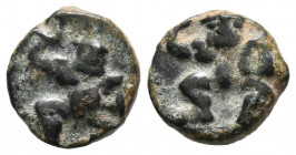 EBUSUS (Ibiza). 1/8 Calco. (Ae. 1,12g/10mm). 300-200 a.C. (FAB-913). Anv: Bes desnudo con martillo y serpiente. Rev: Bes desnudo con martillo y serpie...