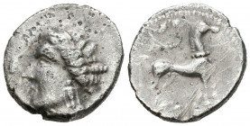 EMPORION (Ampurias, Gerona). Dracma de imitación gala. (Ar. 4,72g/19mm). 200-180 a.C. (FAB-1133). Anv: Cabeza femenina diademada a izquierda, alrededo...