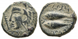 GADES (Cádiz). Semis. (Ae. 6,00g/19mm). 100-20 a.C. (FAB-1347). Anv: Cabeza de Hércules con piel de león a izquierda, delante clava. Rev: Dos atunes a...