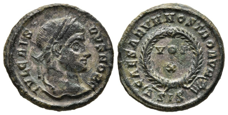 CRISPO. Follis. (Ae. 2,89g/19mm). 321-324. Siscia. (RIC 181). Anv: busto lauread...