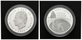 JUAN CARLOS I. 1000 Pesetas. (Ar. 13,50g/33mm). 1996. "JUEGOS OLIMPICOS 1996". Presentada en estuche oficial con certificado. PROOF.