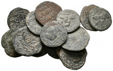 HISPANO ARABE. Lote compuesto por 14 Dirhams Artuqids de bronce. A EXAMINAR.