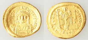 Justinian I the Great (AD 527-565). AV solidus (20mm, 4.29 gm, 6h). Choice XF, flan flaw, scuff. Constantinople, 4th officina. D N IVSTINI-ANVS PP AVG...