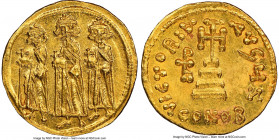 Heraclius (AD 610-641), with Heraclius Constantine and Heraclonas. AV solidus (19mm, 4.34 gm, 7h). NGC Choice MS 5/5 - 4/5, clipped. Constantinople, 7...