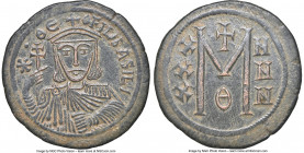 Theophilus (AD 829-842). AE follis (28mm, 7.67 gm, 6h). NGC Choice XF 5/5 - 2/5, scratches. Constantinople. ΘЄOFILOS BASIL, bust of Theophilus facing,...