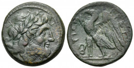 BRUTTIUM, The Brettii. Circa 214-211 BC. Drachm (Bronze, 21.5 mm, 7.99 g, 4 h). Laureate head of Zeus to right. Rev. ΒΡΕΤΤΙΩΝ Eagle standing left with...