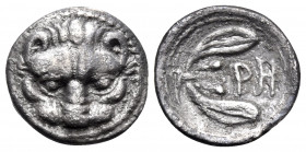 BRUTTIUM. Rhegion. Circa 420-415/410 BC. Litra (Silver, 11 mm, 0.74 g, 5 h). Lion’s mask facing. Rev. PH Olive sprig, with two leaves and two berries....