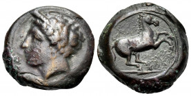 CARTHAGE. Circa 400-350 BC. (Bronze, 16 mm, 4.31 g, 11 h). Wreathed head of Tanit to left. Rev. Horse prancing right. MAA 15. SNG Copenhagen 96. Poros...