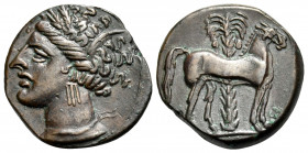 CARTHAGE. Circa 400-350 BC. (Bronze, 15 mm, 2.75 g, 3 h). Wreathed head of Tanit to left. Rev. Horse standing right; palm tree in background. MAA 18. ...