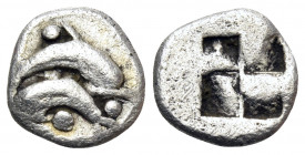 ISLANDS OFF THRACE, Thasos. Circa 500-463 BC. Obol (Silver, 8 mm, 0.47 g). Two dolphins above one another in opposite directions; three pellets around...