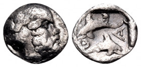 ISLANDS OFF THRACE, Thasos. Circa 412-404 BC. Hemiobol (Silver, 8 mm, 0.38 g, 12 h). Head of bald and bearded Selinos to right. Rev. Θ-Α Two dolphins,...