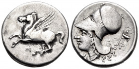 AKARNANIA. Anaktorion. Circa 350-330 BC. Stater (Silver, 20 mm, 8.23 g, 11 h). Pegasos flying left; below, monogram of AN. Rev. AN Helmeted head of At...