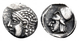 ASIA MINOR. Uncertain. 5th-4th centuries BC. Tetartemorion (Silver, 6 mm, 0.15 g, 10 h). Head of Apollo(?) left, wearing tainia. Rev. Head of Athena l...