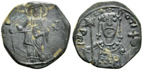 John II Comnenus, 1118-1143. Tetarteron (Bronze, 15 mm, 1.26 g, 6 h), Thessalonika, 1137-1143 (?). IC XC Christ standing facing on dais, holding Gospe...