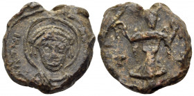 BYZANTINE SEALS, Imperial. Justinian I, 527-565. Seal (Lead, 19 mm, 5.61 g, 12 h). [..]IVSTINI - AN[..] Nimbate, helmeted, and cuirassed facing bust o...