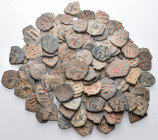 BYZANTINE. Circa 6th - 13th century. (Bronze, 451.00 g). An interesting lot of One Hundred (100) Byzantine bronze coins. Average grade fair to fine or...