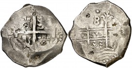 1698. Carlos II. Lima. H. 8 reales. (Cal. 243). 27,07 g. Resellos orientales en ambas caras. Ex Colección Extremadura 29/10/2002, nº 1477. MBC-.