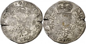 1669. Carlos II. Bruselas. 1 patagón. (Vti. 408) (Vanhoudt 698.BS) (Van Gelder & Hoc 350-2a). 28,01 g. Parte de brillo original. MBC.