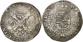 1669. Carlos II. Brujas. 1 patagón. (Vti. 431) (Vanhoudt 698.BG) (Van Gelder & Hoc 350-4a). 27,37 g. MBC-.