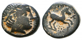 KINGS OF MACEDON. Alexander III 'the Great' (336-323 BC). Ae. Macedonian mint.
Obv: Head of Herakles right.
Rev: AΛΕ / B.
Horseman riding right; in fi...