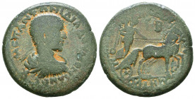 CILICIA, Anazarbus. Diadumenian. As Caesar, AD 217-218. Æ Triassarion. Bareheaded, draped, and cuirassed bust right / Nike driving biga right. Ziegler...