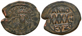 Phocas (602-610 AD). AE 

Condition: Very Fine

Weight: 11,3 gr
Diameter: 30,4 mm