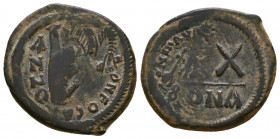 Phocas (602-610 AD). AE 

Condition: Very Fine

Weight: 6,6 gr
Diameter: 25,4 mm