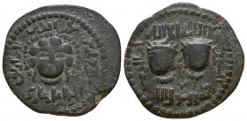 Artuqids of Mardin. Najim al-Din Alpi. 547-572/1152-1176. AE dirhem . struck 560-566/1164-1171. Two diademed male heads facing, turned slightly away /...