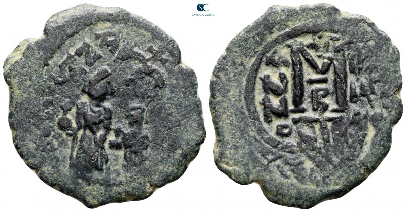 Heraclius, with Heraclius Constantine and Heraclonas AD 610-641. Nikomedia
Foll...