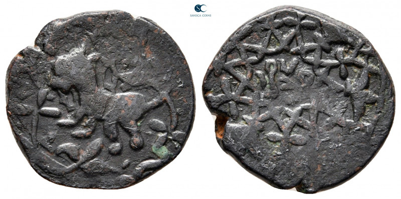 Artuqids of Mardin. Undeciphered mint, perhaps Mardin AH 1010-1020. 
Fulus Æ 
...