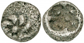 Ionia, Uncertain mint. Ca. 500-480 B.C. AR hemitetartemorion -Ninety-sixth Stater (4 mm, 0.09 g). Rosette on raised disk / Cruciform incuse with pelle...