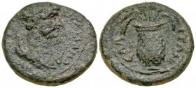 Aeolis, Elaea. Commodus. A.D. 177-192. AE hemiassarion (16.3 mm, 3.03 g, 12 h). Struck ca. A.D. 179-180. Λ ΑV ΚOΜOΔO, laureate, draped and cuirassed b...