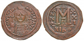Justinian I. 527-565. AE follis (36.7 mm, 18.95 g, 7 h). Nicomedia mint, Struck 547/8. D N IVSTINI-ANVS P P AVI, helmeted and cuirassed bust of Justin...