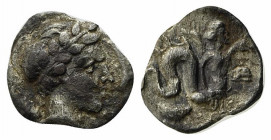 Campania, Allifae, c. 325-275 BC. AR Obol (9.5mm, 0.52g, 3h). Laureate head of Apollo r.; three dolphins around. R/ Skylla r., holding sepia and fish;...