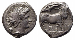 Southern Campania, Neapolis, c. 320-300 BC. AR Didrachm (18.5mm, 7.52g, 6h). Head of nymph r.; grape bunch behind. R/ Man-headed bull walking r.; abov...