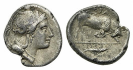 Southern Lucania, Thourioi, c. 350-300 BC. AR Triobol (12mm, 1.18g, 2h). Helmeted head of Athena r., helmet decorated with Skylla throwing stone. R/ B...