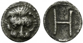 Bruttium, Rhegion, c. 415-387 BC. AR Hemilitron (6.5mm, 0.29g). Facing lion's head. R/ Large H. HNItaly 2500; SNG ANS 675. VF