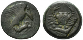 Sicily, Akragas, c. 425-406 BC. Æ Tetras (23mm, 8.23g, 11h). Eagle standing r. on hare, head lowered, wings spread. R/ Crab; below, three pellets and ...